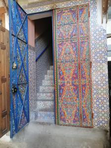 an entrance to a room with an open door at Dar mahfoud in Rabat