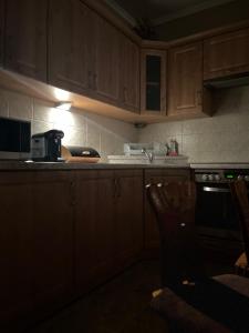 Kuchyňa alebo kuchynka v ubytovaní Apartament Familijny Beskidzki