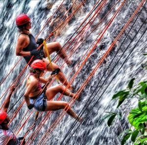 a group of people on a raft in the water at Flat Centro Rota Cachoeira in Bonito
