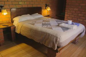 Postel nebo postele na pokoji v ubytování Casa Hospedaje"Los Capulies" + 37 fotografií