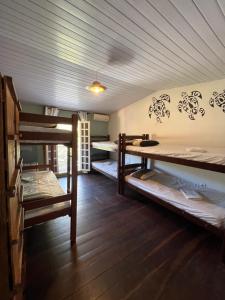 Кровать или кровати в номере Casa Baiana do Mar