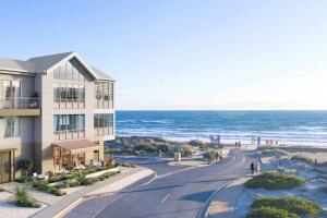 a rendering of the oceanfront condos at the beach at Hamptons-inspired Waterfront Living on Moana Beach in Moana