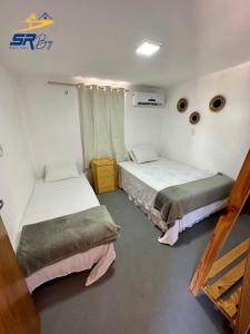 Zimmer mit 2 Betten in einem Zimmer in der Unterkunft SRBG Casa em Barra Grande-PI in Barra Grande