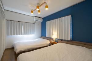 Postel nebo postele na pokoji v ubytování S-villa Nasu 11th + 25 fotografií