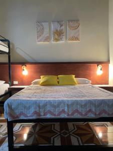 Letto o letti in una camera di POSADA MIRADIA