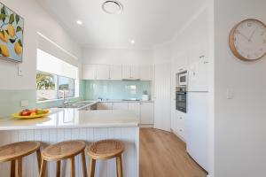 Kuchyň nebo kuchyňský kout v ubytování Clearwater Noosa Resort