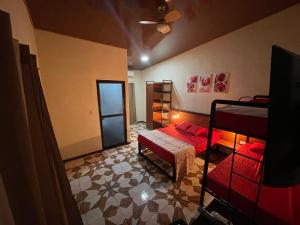 Letto o letti in una camera di POSADA MIRADIA