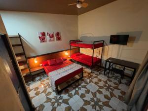 Letto o letti in una camera di POSADA MIRADIA