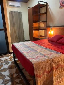 Letto o letti in una camera di POSADA MIRADIA