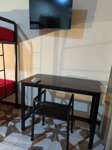 Letto o letti in una camera di POSADA MIRADIA