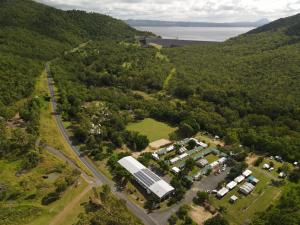 an aerial view of a building in the middle of a forest at Lions Camp Kanga in Dittmer