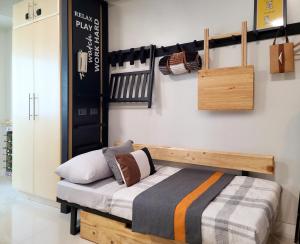 Posteľ alebo postele v izbe v ubytovaní Relaxing Apt Bgc Business Ready with 84inch Cinema