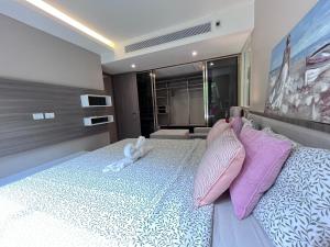 Voodi või voodid majutusasutuse 市中心URBITIA 精品公寓 toas
