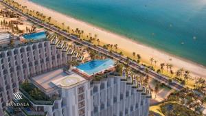 an aerial view of a hotel and the beach at Apec Nirvana Peace Mui Ne in Mui Ne