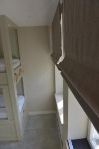 Letto o letti in una camera di Five Point Hostel & Apartments