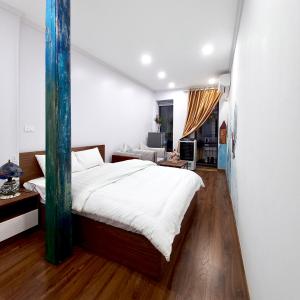 Postel nebo postele na pokoji v ubytování Amelié Homestay