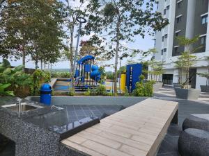 a playground in the middle of a building at SY@Tiara Homestay in Bangi