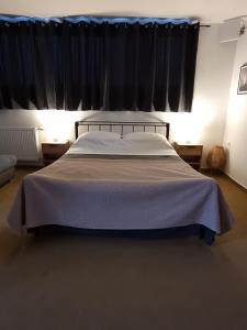 Postel nebo postele na pokoji v ubytování Apartment Atlas
