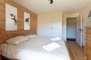מיטה או מיטות בחדר ב-Apartment Olympus