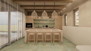 uma cozinha com uma ilha num quarto com janelas em CasaCarma IV, private XL Pool, Boho-Design em Lakhania