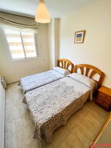 Postel nebo postele na pokoji v ubytování El Paraíso en Playa Concha