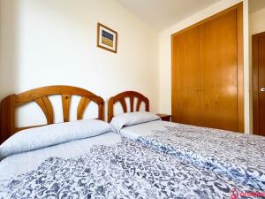 Postel nebo postele na pokoji v ubytování El Paraíso en Playa Concha