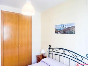 Postel nebo postele na pokoji v ubytování El Paraíso en Playa Concha