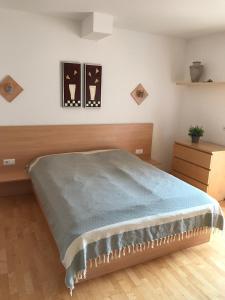 Postel nebo postele na pokoji v ubytování Panorama Spa Lodges DAS.SCHILLER