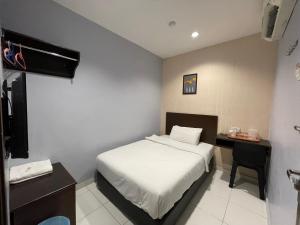 TV a/nebo společenská místnost v ubytování M Three Hotel by SECOMS + 17 fotografií