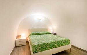 Giường trong phòng chung tại Iris Apartment, comfort e stile nel cuore di Bisceglie