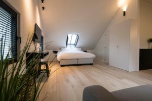 Postel nebo postele na pokoji v ubytování B&B Amelhof