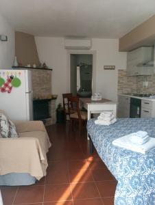 Kuchyň nebo kuchyňský kout v ubytování Tigullio Vacations panoramica apartments + 37 fotografií