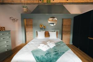 Postel nebo postele na pokoji v ubytování Au coin de Paradis