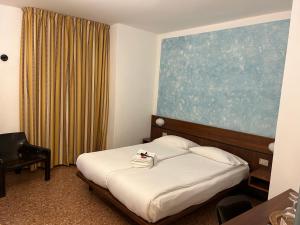 Postel nebo postele na pokoji v ubytování Hotel "ALBERGO DA PINA"