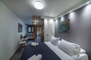 Posteľ alebo postele v izbe v ubytovaní Filia's Memories Apartments