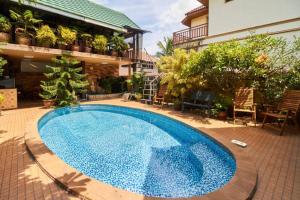Swimmingpoolen hos eller tæt på Bungalow Phuket