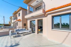 a villa with a view of the ocean at Villa Elpida TWO by Ezoria Villas in Timi, Paphos in Ktima