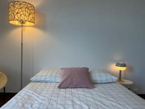 Postel nebo postele na pokoji v ubytování Suite Miramar - Check in h24 - Wifi