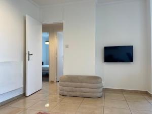 TV a/nebo společenská místnost v ubytování Suite Miramar - Check in h24 - Wifi