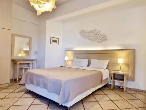 Posteľ alebo postele v izbe v ubytovaní Panorama Apartments Fiscardo