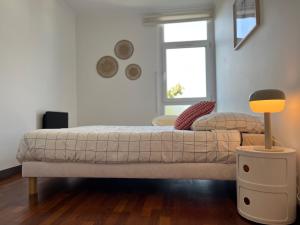 Postel nebo postele na pokoji v ubytování Suite Miramar - Check in h24 - Wifi