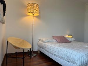 Postel nebo postele na pokoji v ubytování Suite Miramar - Check in h24 - Wifi