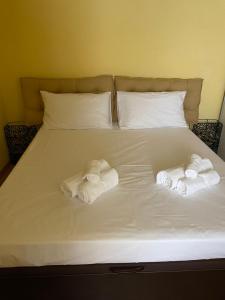 Postel nebo postele na pokoji v ubytování Candelieri Suites