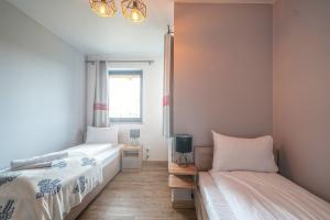 Postel nebo postele na pokoji v ubytování APARTAMENT D3