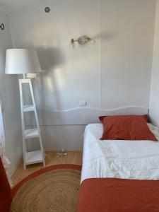 Postel nebo postele na pokoji v ubytování TINY HOUSE