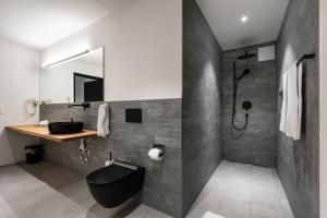 Koupelna v ubytování Melchtal Resort Apart Hotel