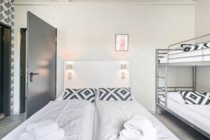 Cama ou camas em um quarto em WALLYARD Stay