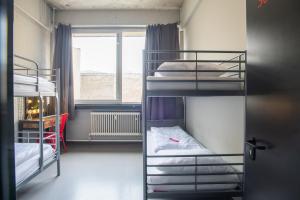 Cama ou camas em um quarto em WALLYARD Stay