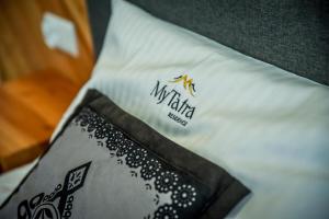 Posteľ alebo postele v izbe v ubytovaní My Tatra Residence