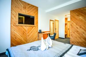 Posteľ alebo postele v izbe v ubytovaní My Tatra Residence